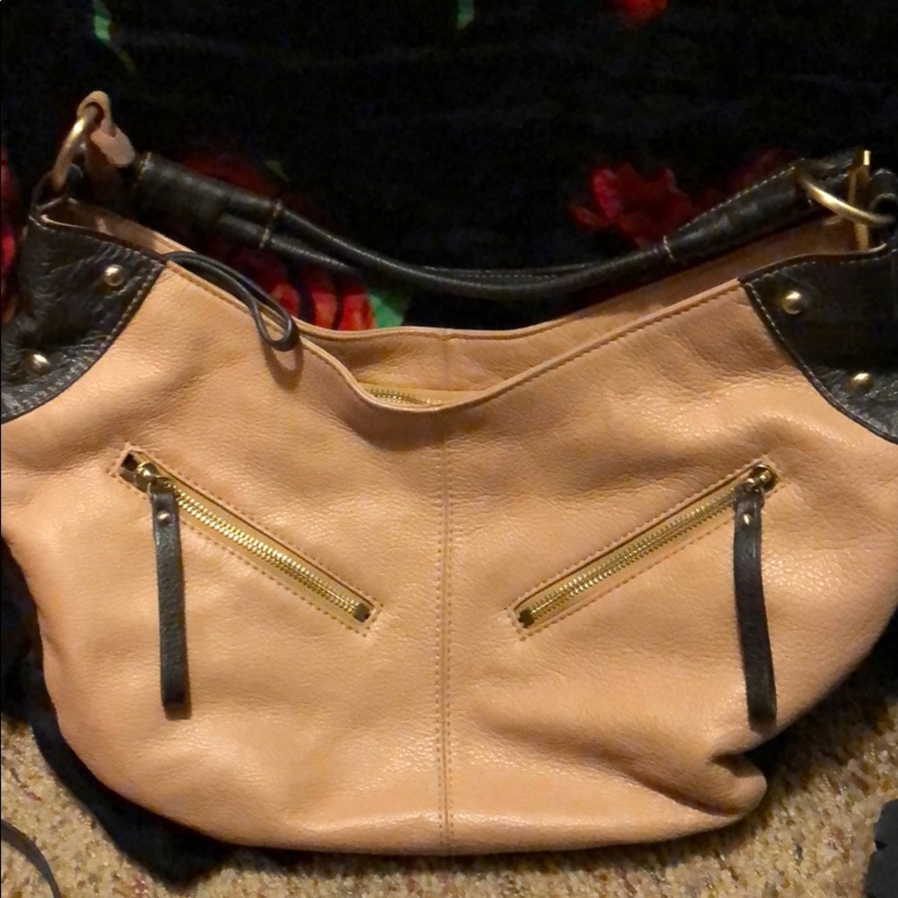 Celsius tan leather handbag with brown accents